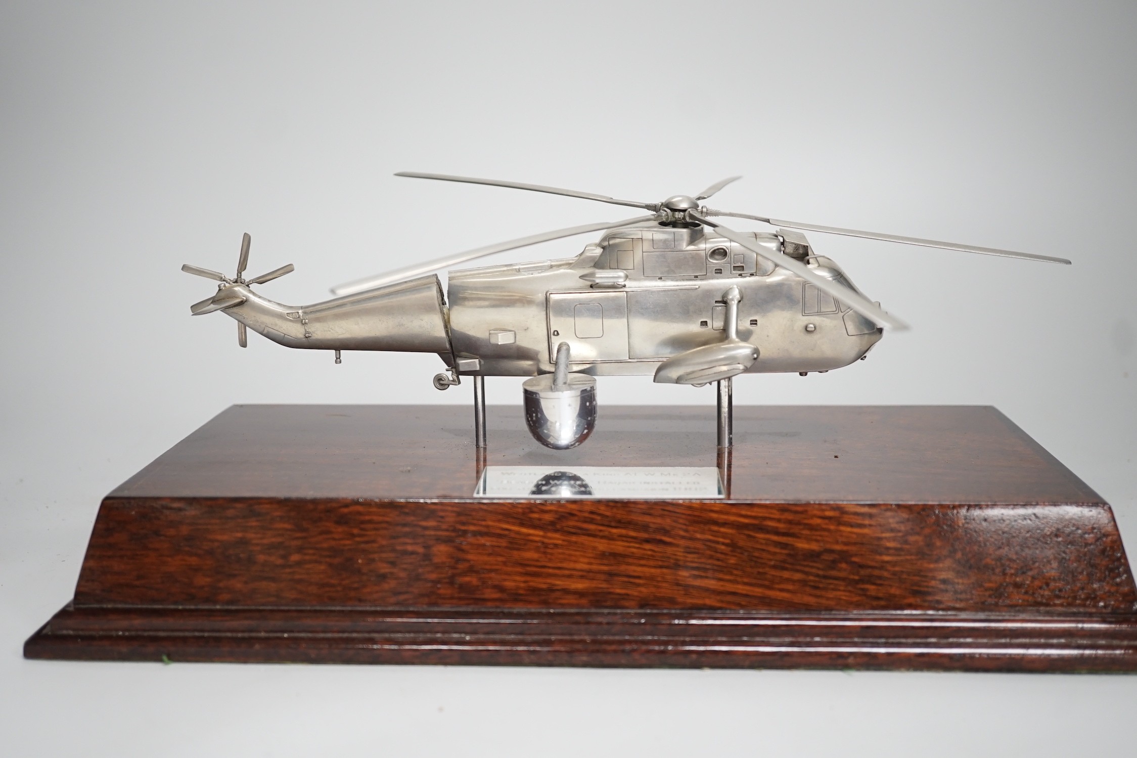 A model of a Sea King helicopter by Brian Banbury, with original case, Helicopter stand 34cm long